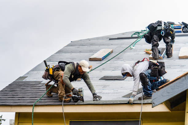 Professional Gutter Installation technician working in North Uxbridge, MA